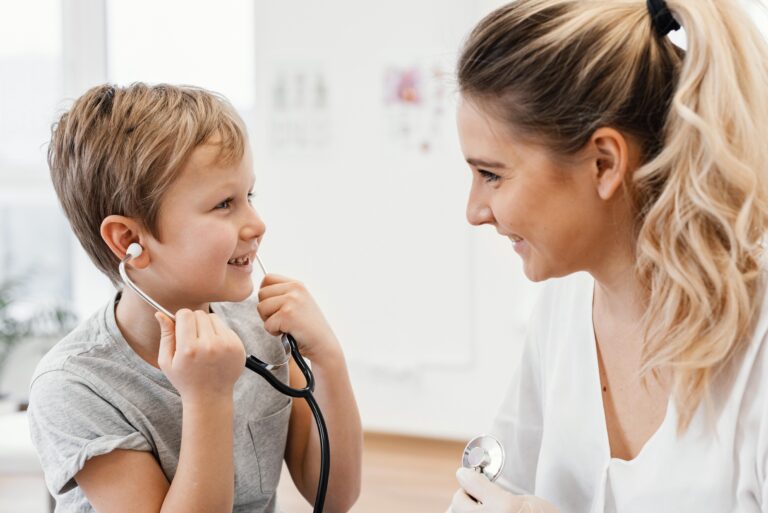 close up smiley pediatrician kid 768x513