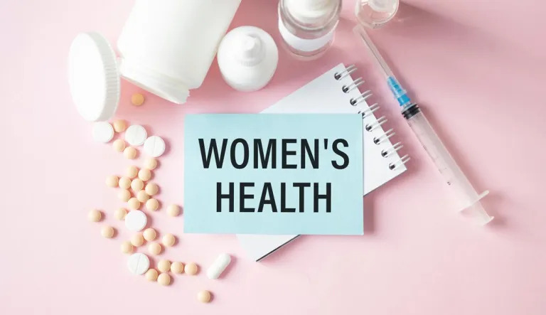 stethoscope note book with women s health words as medical concept 292052 627